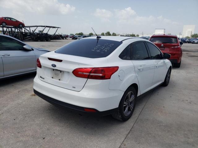Photo 4 from auction – 2018 FORD FOCUS SE with VIN 1FADP3F22JL200990