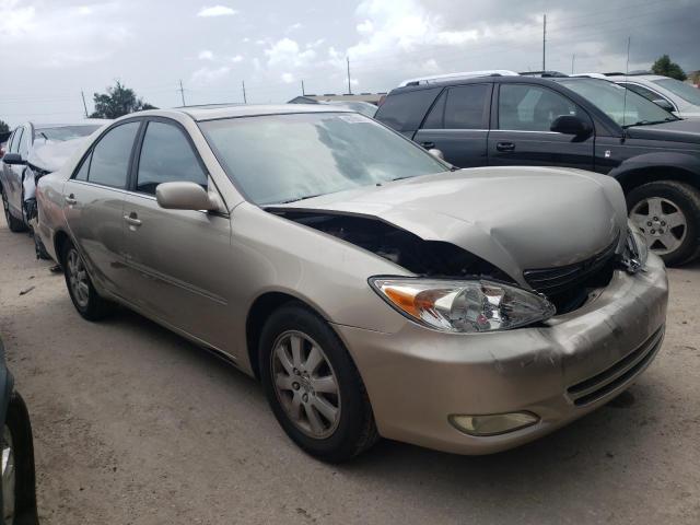 TOYOTA CAMRY LE 2004 with VIN 4T1BE32K74U843567 - Photo from auction