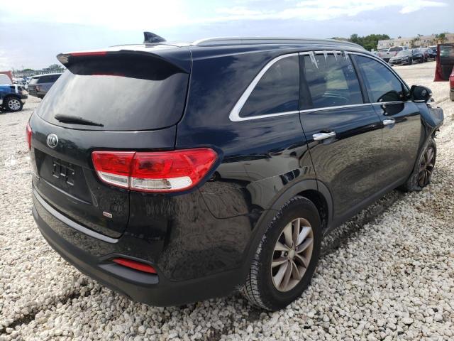 Photo 4 from auction – 2016 KIA SORENTO LX with VIN 5XYPG4A34GG129681