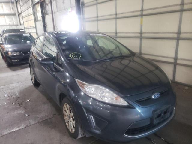 FORD FIESTA SE 2011 with VIN 3FADP4EJ6BM168088 - Photo from auction