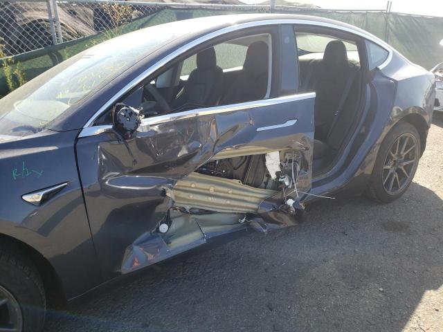 Photo 9 from auction – 2018 TESLA MODEL 3 with VIN 5YJ3E1EB4JF128386