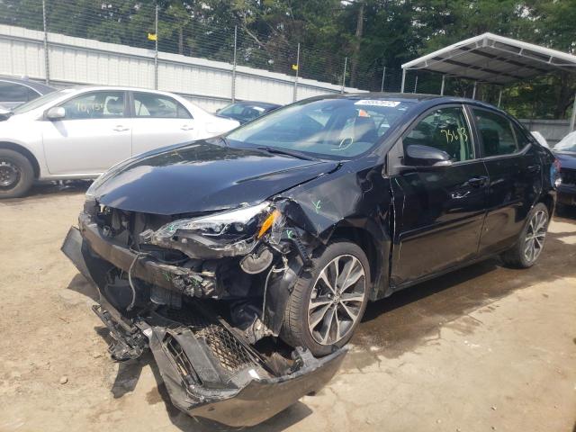 Photo 2 from auction – 2017 TOYOTA COROLLA L with VIN 5YFBURHE9HP720268
