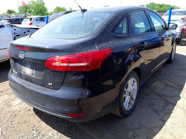 Photo 4 from auction – 2017 FORD FOCUS SE with VIN 1FADP3F21HL209934