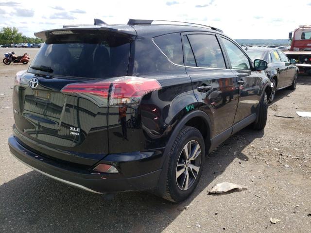 Photo 4 from auction – 2018 TOYOTA RAV4 ADVEN with VIN 2T3RFREV2JW744064