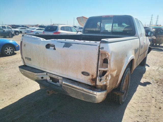 Photo 4 from auction – 2000 FORD F150 with VIN 1FTRX18L4YKA66848