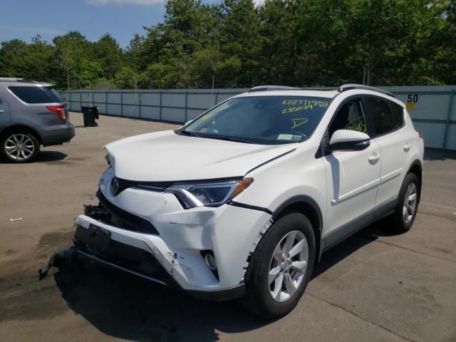 Photo 2 from auction – 2018 TOYOTA RAV4 with VIN JTMRFREV4JD235039