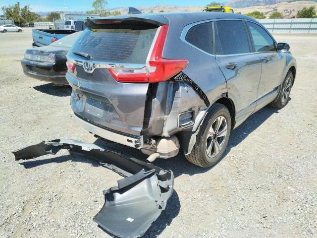 Photo 4 from auction – 2017 HONDA CR-V LX with VIN 7FARW5H34HE011389