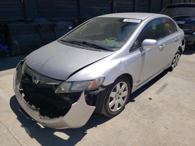 Photo 2 from auction – 2011 HONDA CIVIC LX with VIN 2HGFA1F57BH532958