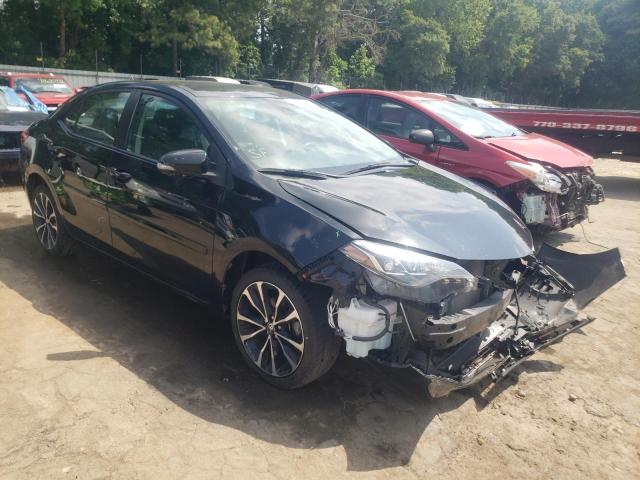 TOYOTA COROLLA L 2017 with VIN 5YFBURHE9HP720268 - Photo from auction
