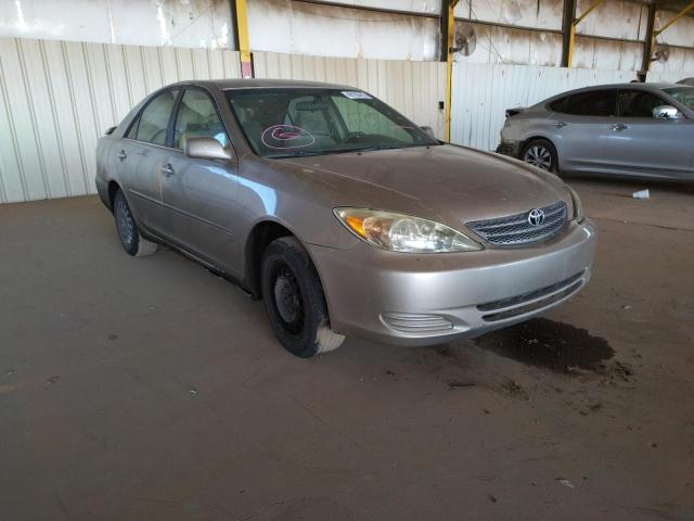 TOYOTA CAMRY LE 2002 with VIN JTDBE32KX20024691 - Photo from auction