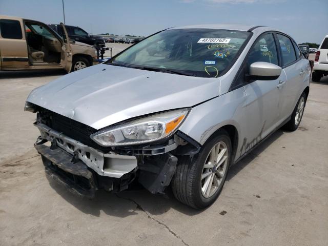 Photo 2 from auction – 2018 FORD FOCUS SE with VIN 1FADP3F23JL207723