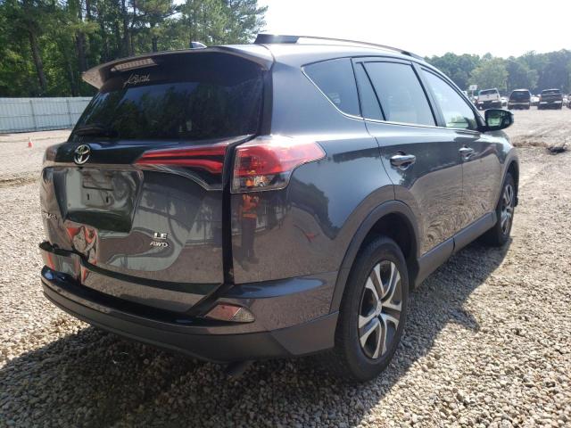 Photo 4 from auction – 2018 TOYOTA RAV4 LE with VIN 2T3BFREV1JW766056
