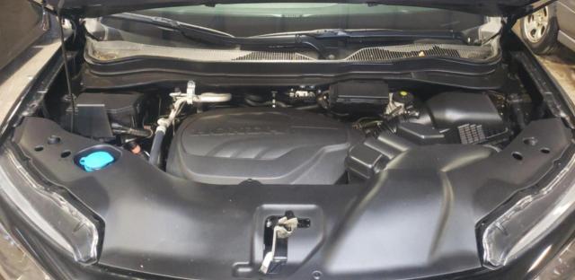 Photo 7 from auction – 2021 HONDA PASSPORT E with VIN 5FNYF8H56MB032961