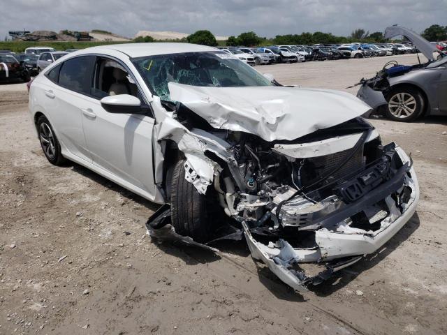 HONDA CIVIC LX 2019 with VIN 19XFC2F66KE019591 - Photo from auction