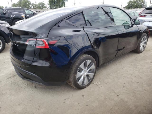 Photo 4 from auction – 2021 TESLA MODEL Y with VIN 5YJYGDED0MF109809