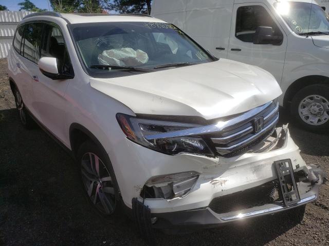 HONDA PILOT ELIT 2018 with VIN 5FNYF6H0XJB043885 - Photo from auction