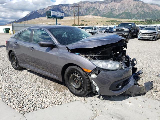 HONDA CIVIC LX 2018 with VIN 19XFC2E52JE013715 - Photo from auction
