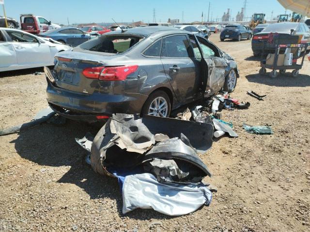 Foto 4 de la subasta – 2018 FORD FOCUS SE con VIN 1FADP3FE1JL304364