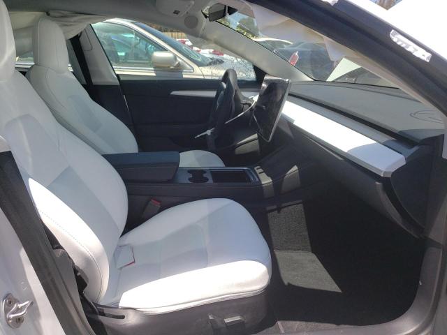 Photo 5 from auction – 2021 TESLA MODEL 3 with VIN 5YJ3E1EC1MF000734