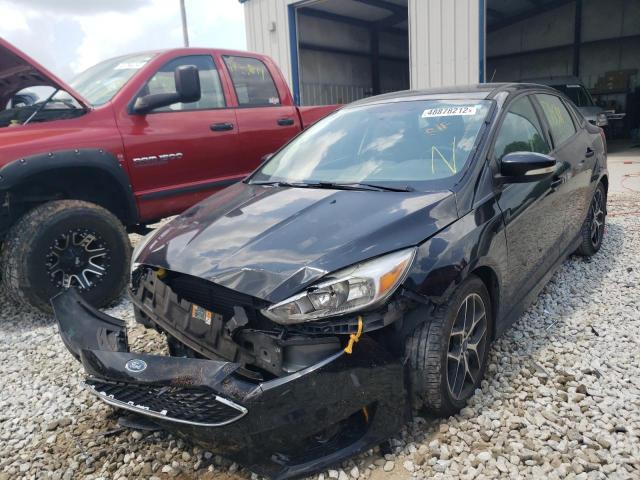 Photo 2 from auction – 2016 FORD FOCUS SE with VIN 1FADP3F26GL313382