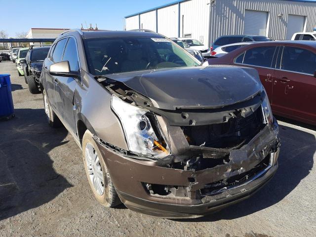 CADILLAC SRX LUXURY 2014 with VIN 3GYFNEE31ES580039 - Photo from auction