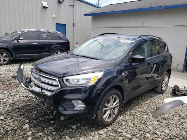 Photo 2 from auction – 2018 FORD ESCAPE SE with VIN 1FMCU9GD5JUC99442
