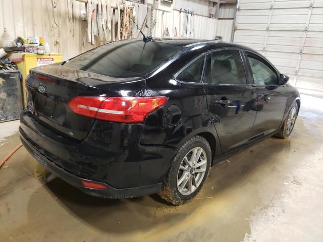 Photo 4 from auction – 2018 FORD FOCUS SE with VIN 1FADP3F21JL216615