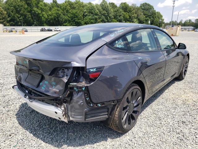 Photo 4 from auction – 2021 TESLA MODEL 3 with VIN 5YJ3E1EC0MF061878