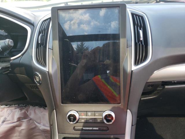 Photo 9 from auction – 2021 FORD EDGE SEL with VIN 2FMPK4J92MBA24619