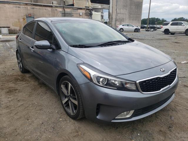 KIA FORTE EX 2017 with VIN 3KPFL4A8XHE005562 - Photo from auction