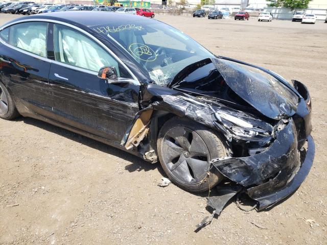 Photo 10 from auction – 2019 TESLA MODEL 3 with VIN 5YJ3E1EA4KF306161
