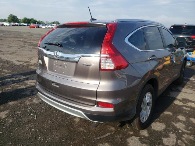 Photo 4 from auction – 2015 HONDA CR-V EXL with VIN 5J6RM4H77FL010126