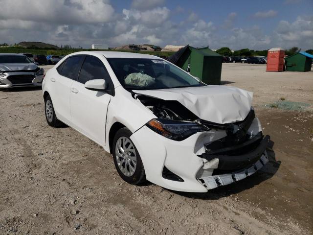 TOYOTA COROLLA L 2019 with VIN 5YFBURHE1KP920150 - Photo from auction