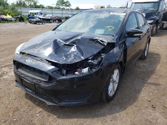 Photo 2 from auction – 2015 FORD FOCUS SE with VIN 1FADP3F22FL260193