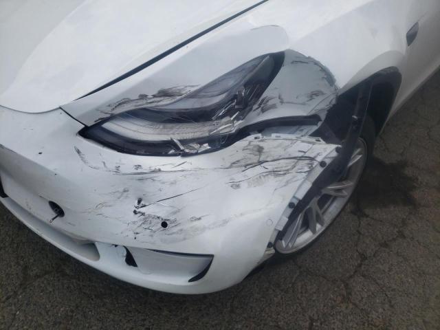 Photo 10 from auction – 2021 TESLA MODEL Y with VIN 5YJYGDEE8MF160239