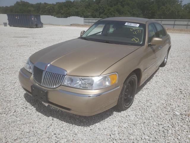 Photo 2 from auction – 1998 LINCOLN TOWN CAR E with VIN 1LNFM81W3WY650477