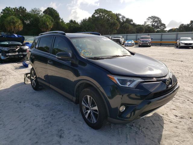 TOYOTA RAV4 XLE 2017 with VIN JTMWFREV2HJ111480 - Photo from auction