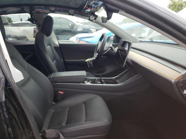 Photo 5 from auction – 2021 TESLA MODEL Y with VIN 5YJYGDED0MF109809