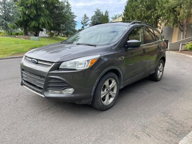 Photo 2 from auction – 2016 FORD ESCAPE SE with VIN 1FMCU9GX3GUB49669
