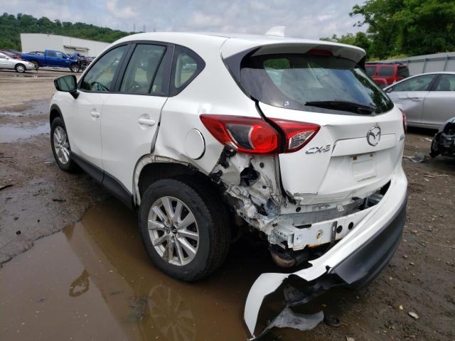 Photo 3 from auction – 2014 MAZDA CX-5 SPORT with VIN JM3KE2BE7E0377731
