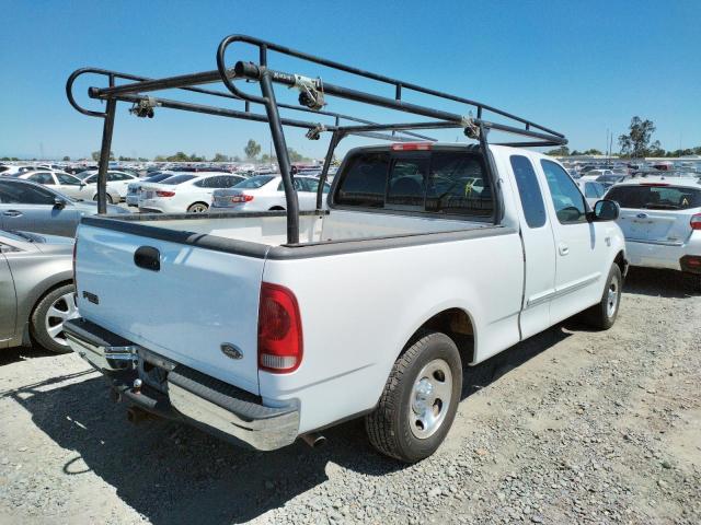 Photo 4 from auction – 2000 FORD F150 with VIN 1FTRX17W6YNC03802