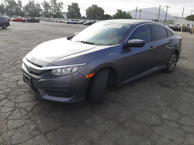 Photo 2 from auction – 2017 HONDA CIVIC LX with VIN 2HGFC2F50HH558357
