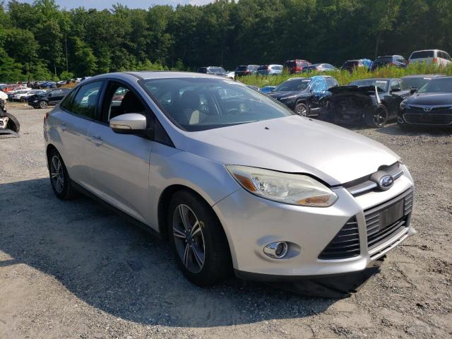 FORD FOCUS SE 2014 with VIN 1FADP3F21EL215759 - Photo from auction