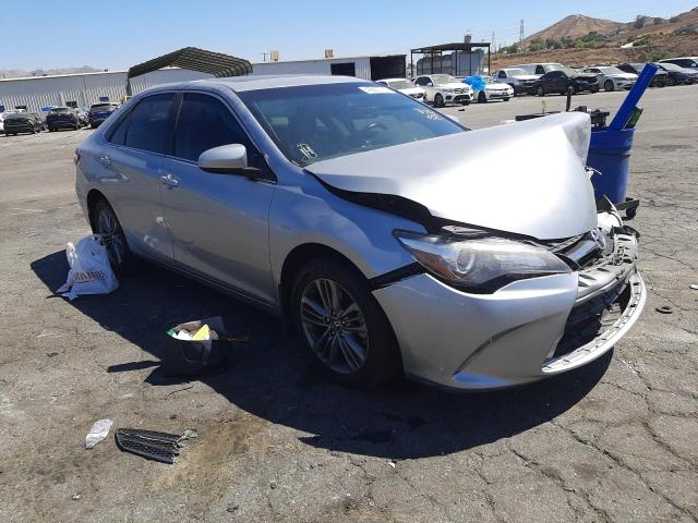 TOYOTA CAMRY LE 2017 with VIN 4T1BF1FKXHU374430 - Photo from auction