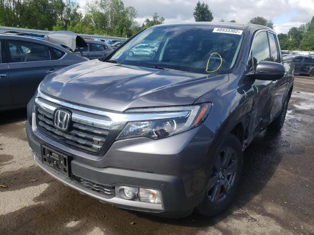 Photo 2 from auction – 2020 HONDA RIDGELINE with VIN 5FPYK3F72LB013137