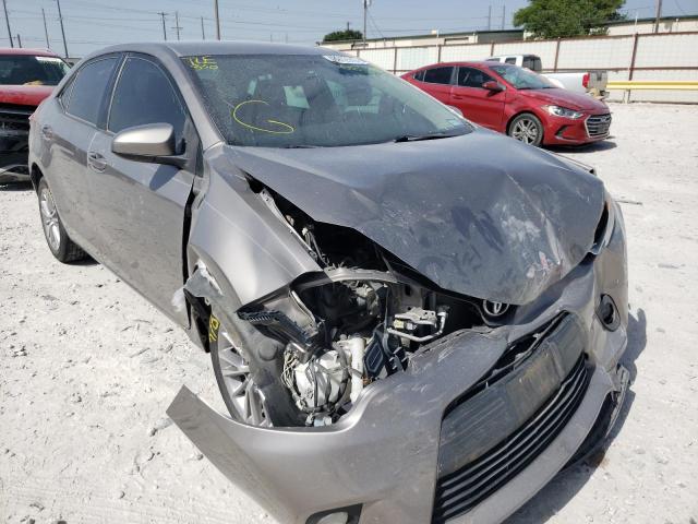 TOYOTA COROLLA L 2014 with VIN 5YFBURHE4EP090218 - Photo from auction