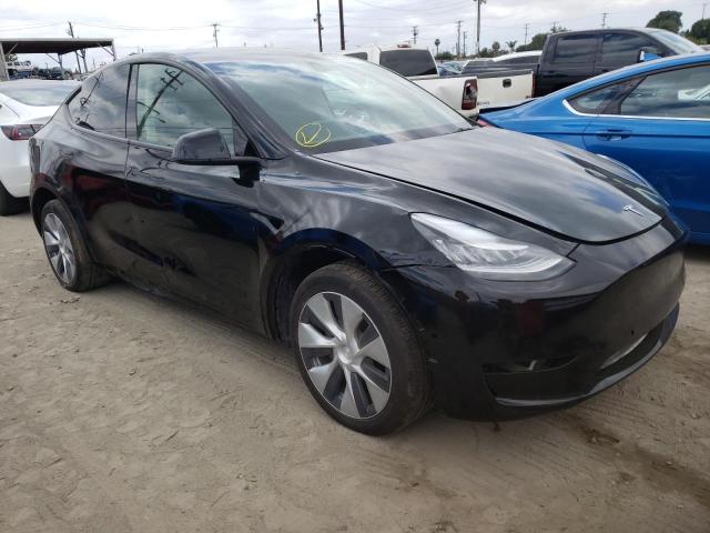 TESLA MODEL Y 2021 with VIN 5YJYGDED0MF109809 - Photo from auction