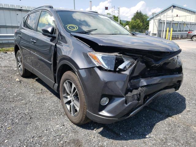 TOYOTA RAV4 XLE 2017 with VIN JTMRFREV7HJ707875 - Photo from auction