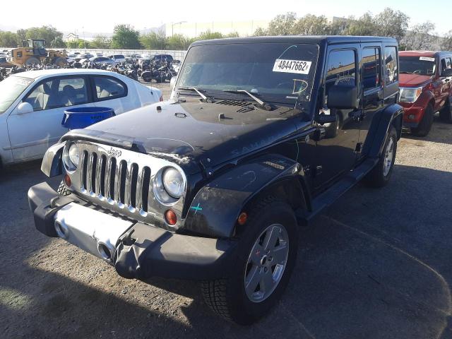 Photo 2 from auction – 2011 JEEP WRANGLER U with VIN 1J4BA5H17BL533247