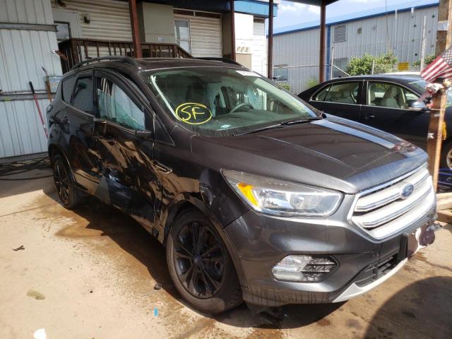 FORD ESCAPE SE 2018 with VIN 1FMCU9GD2JUB07328 - Photo from auction